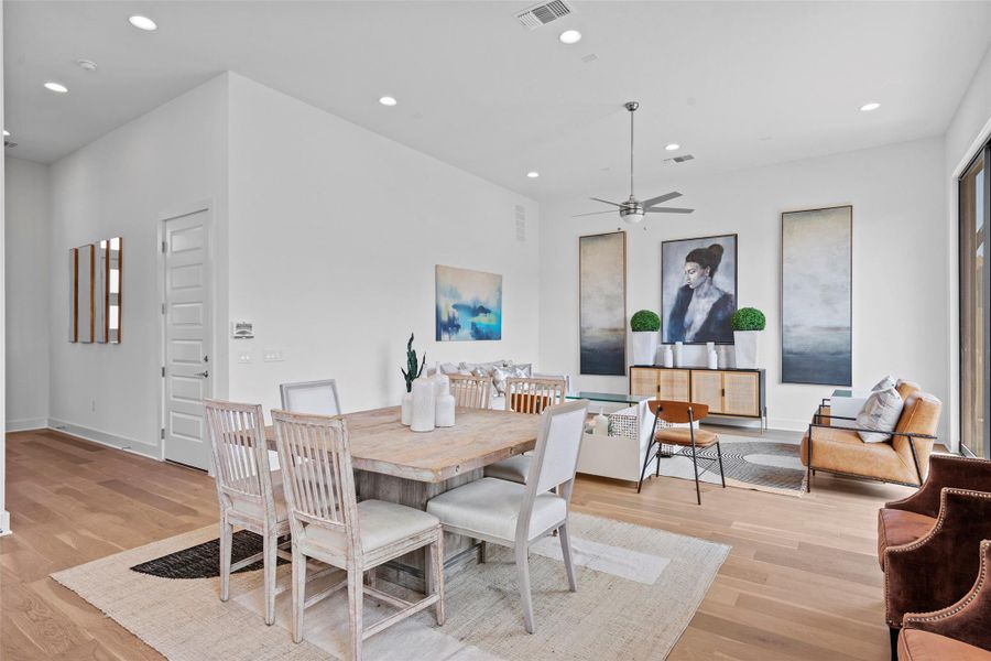 As you enter the home, you are welcomed into the spacious layout that blends the utility of the kitchen with the comfort of the family and dining spaces.