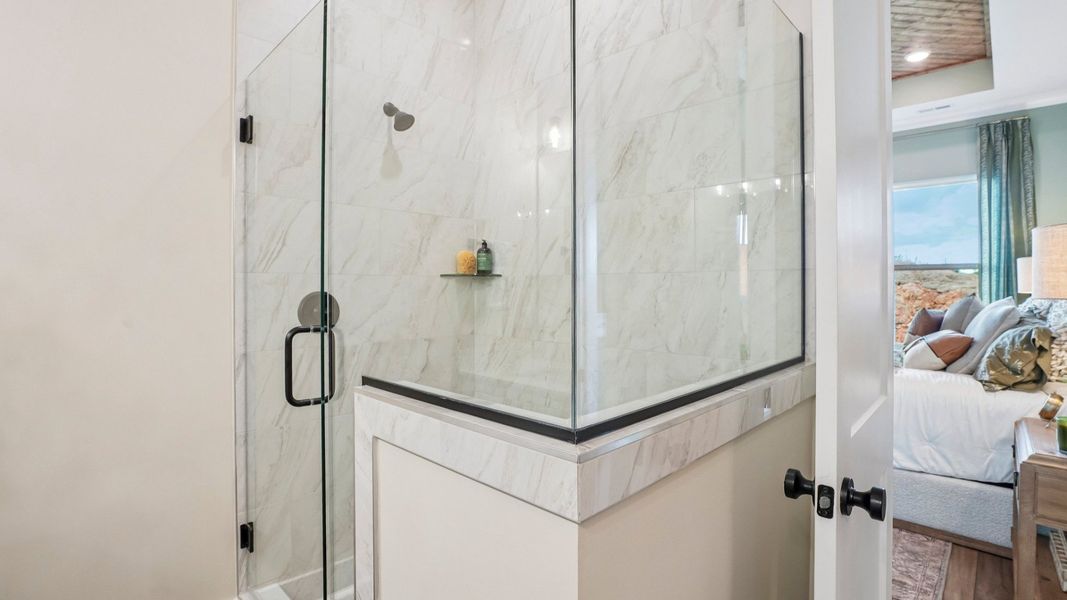 Primary bathroom with glass enclosed shower Primary bathroom with glass enclosed shower