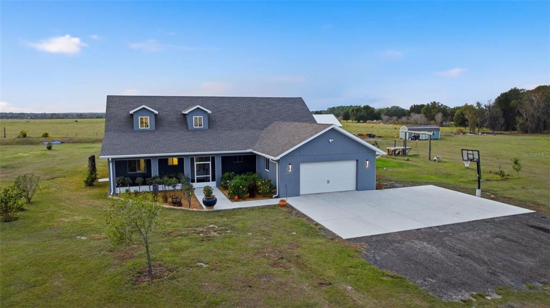 Front exterior of a new home in , Dade City, FL, highlighting curb appeal (Image 32).