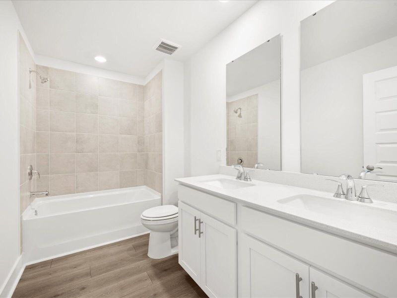 Furnished interior view inside a new home in The Coves at Lakes of Cane Bay, Summerville (Image 14).