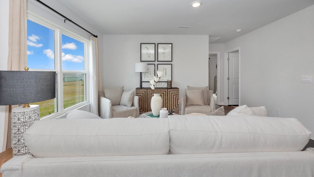 Representative furnished interior of a home built from the Aldridge by D.R. Horton in Bailey Park, Fayetteville (Image 15).