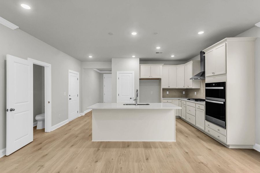 Furnished interior view inside a new home in Tidewater at Lakes of Cane Bay, Summerville (Image 13).