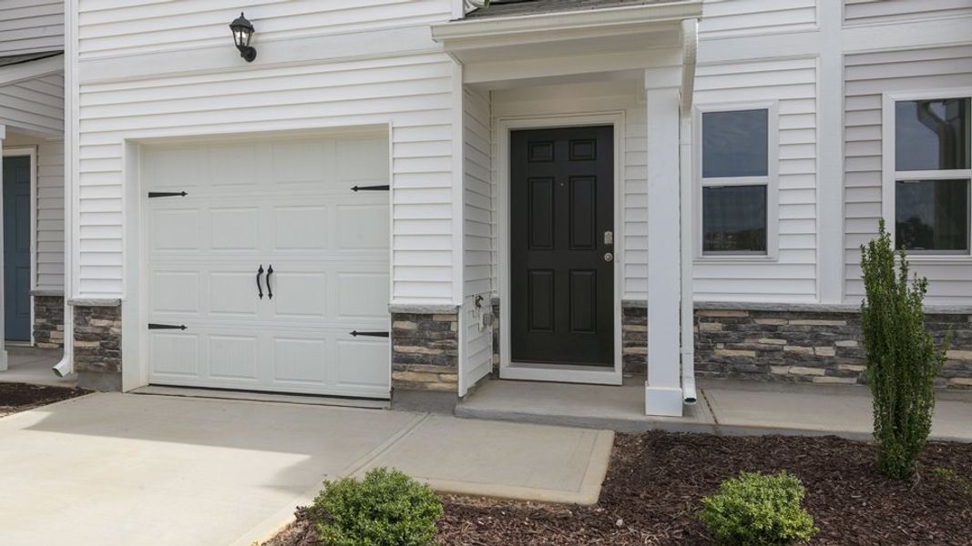 Exterior details and patio area of a home in The Townes at Wilson's Ridge, Smithfield (Image 2).