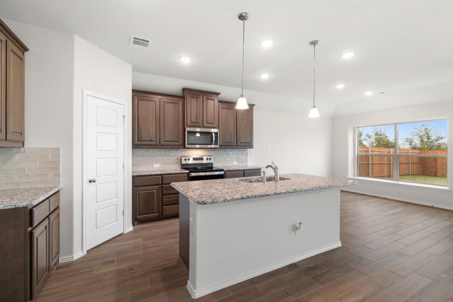 Kitchen | Concept 1660 at Hunters Ridge in Crowley, TX by Landsea Homes