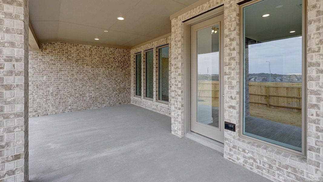 Exterior details and patio area of a home in Ladera, San Antonio (Image 19).