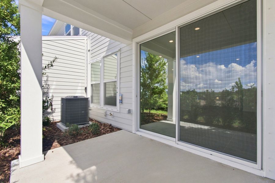 Exterior details and patio area of a home in Waterset Townhomes, Apollo Beach (Image 3). Exterior details and patio area of a home in Waterset Townhomes, Apollo Beach (Image 3).