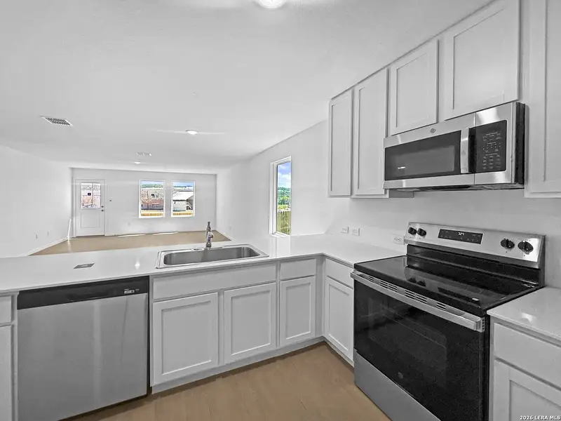 Furnished interior view inside a new home in Ridgeland, Kerrville (Image 8). Furnished interior view inside a new home in Ridgeland, Kerrville (Image 8).