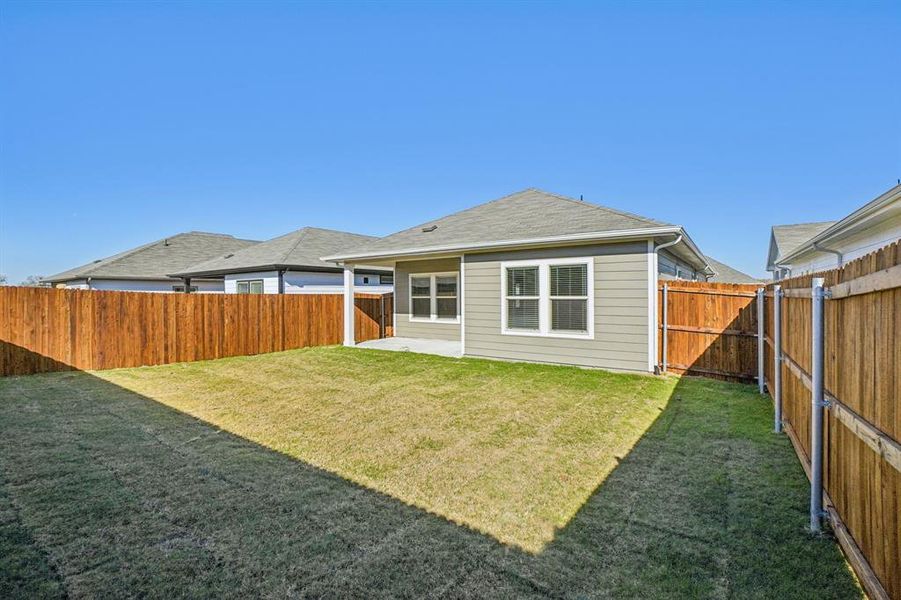 Exterior details and patio area of a home in Trails of Lavon - Spring Series, Lavon (Image 3).