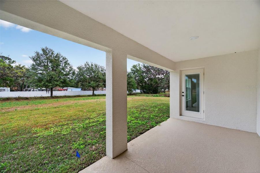 Exterior details and patio area of a home in Hill Country Estates, Dade City (Image 25).