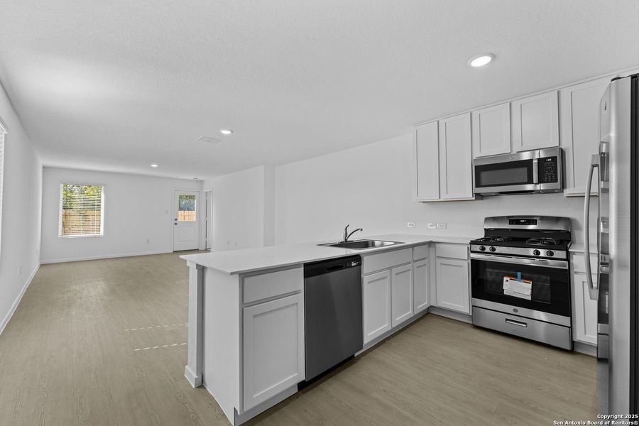 Furnished interior view inside a new home in Torian Village: Belmar Collection, San Antonio (Image 4).