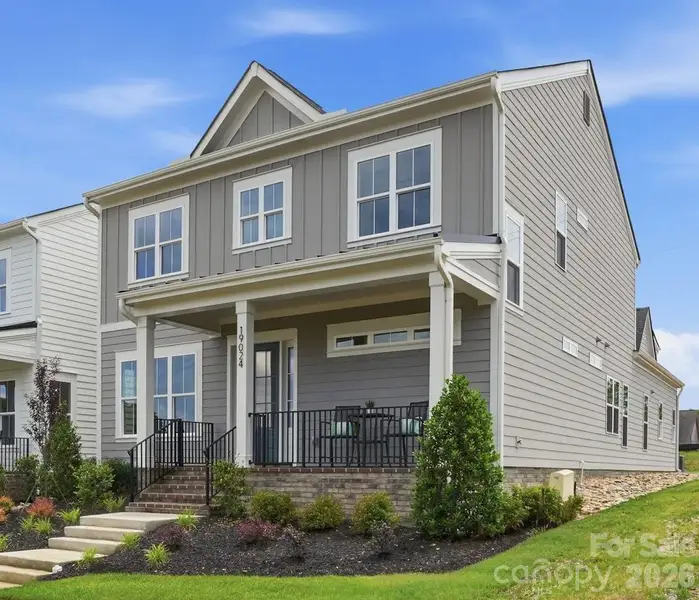 Front exterior of a new home in , Davidson, NC, highlighting curb appeal (Image 2). Front exterior of a new home in , Davidson, NC, highlighting curb appeal (Image 2).