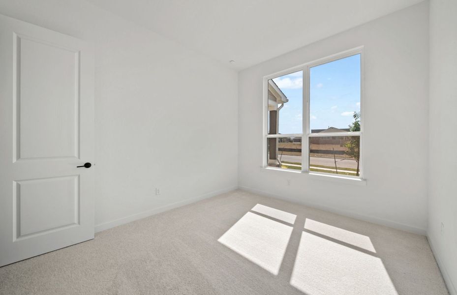 Spacious, unfurnished interior of a new home in 6 Creeks, Kyle (Image 17).