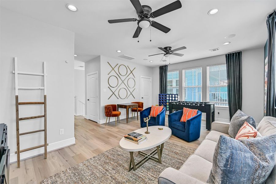 This rare feature in Beachside Village stands out! The upstairs living area creates the perfect flex space for movie nights, games, or relaxing after the beach. The open layout gives buyers endless possibilities.