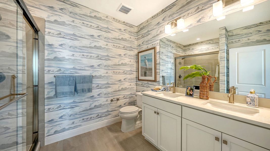 Representative furnished interior of a home built from the Avery by Neal Communities in SkySail, Naples (Image 26).