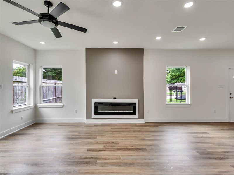 Family Room with accent wall & fireplace Family Room with accent wall & fireplace