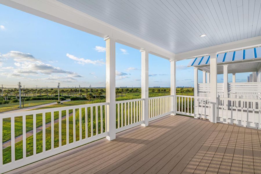 Rear covered porch with Azek decking and painted ceiling.