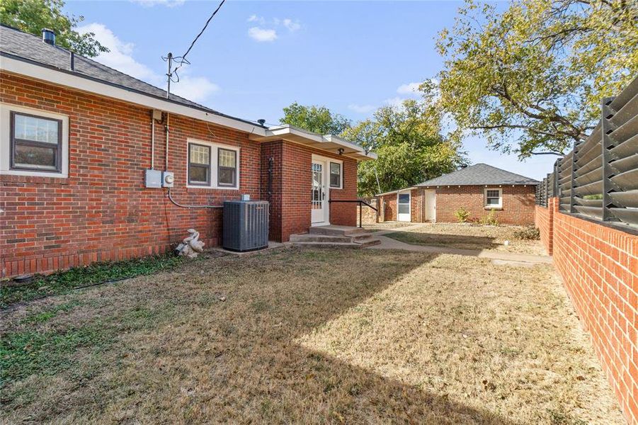 Exterior details and patio area of a home in , Coleman (Image 4). Exterior details and patio area of a home in , Coleman (Image 4).
