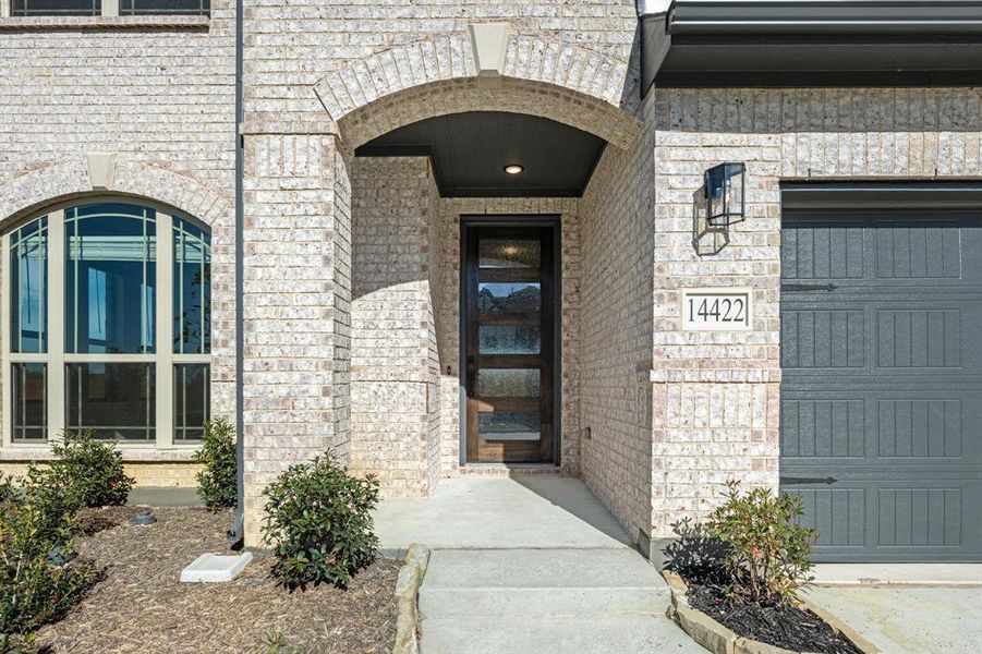 Exterior details and patio area of a home in Creekview Meadows, Pilot Point (Image 3).