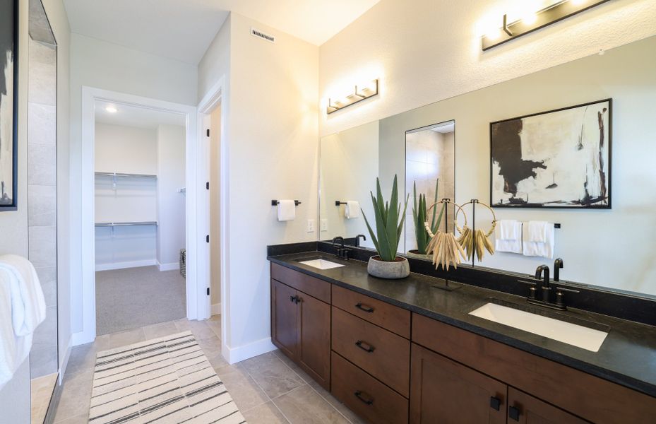 Furnished interior view inside a new home in Hilltop at Inspiration, Aurora (Image 14).