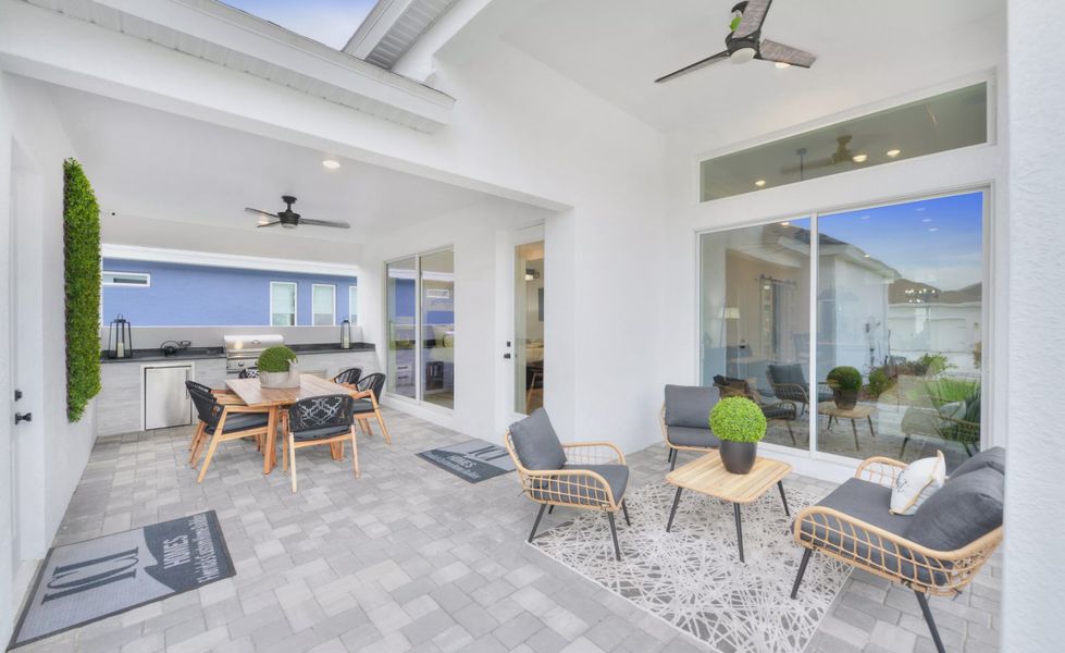 Exterior details and patio area of a home in Persimmon Park, Wesley Chapel (Image 4).