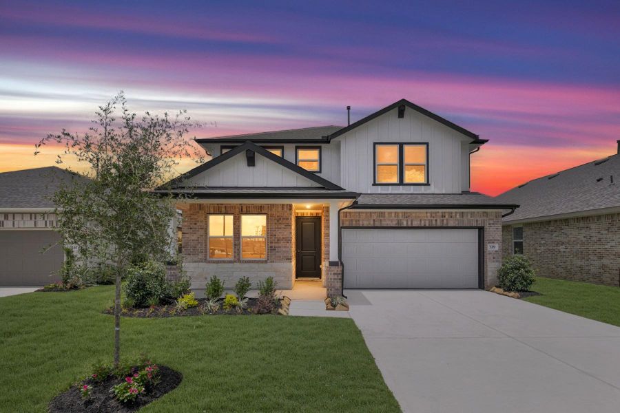 Front exterior of a new home in The Hills of Town Creek, Montgomery, TX, highlighting curb appeal (Image 2). Front exterior of a new home in The Hills of Town Creek, Montgomery, TX, highlighting curb appeal (Image 2).