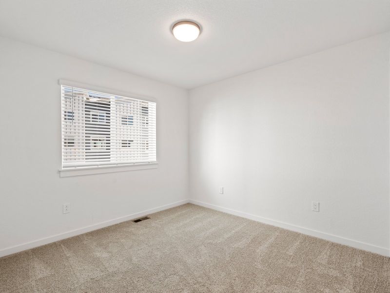 Spacious, unfurnished interior of a new home in The Vistas at West Mesa, Colorado Springs (Image 21).