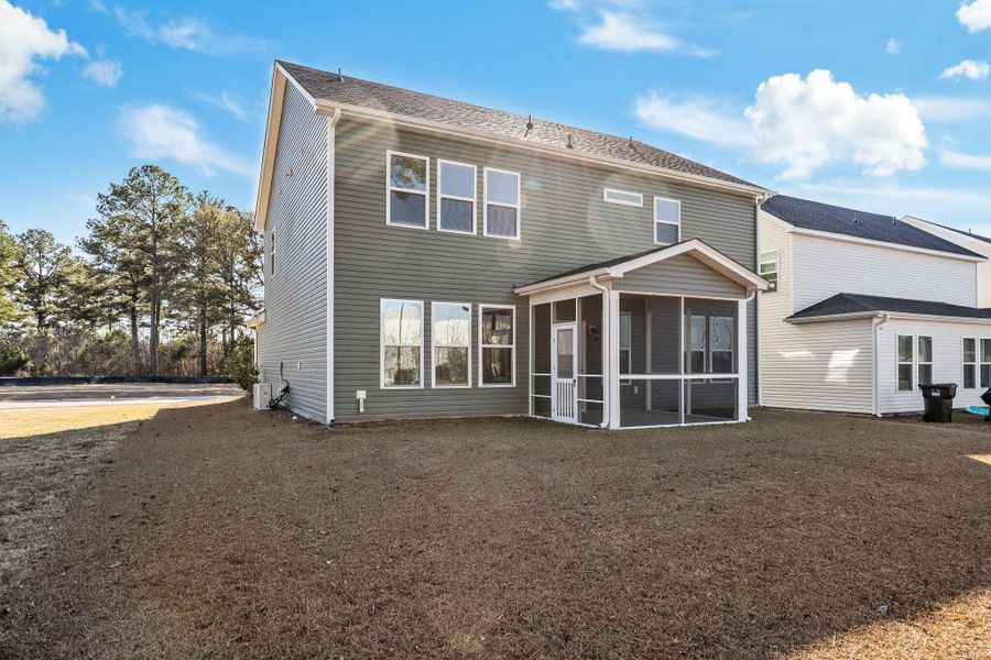 Exterior details and patio area of a home in The Groves of Berkeley, Moncks Corner (Image 4).