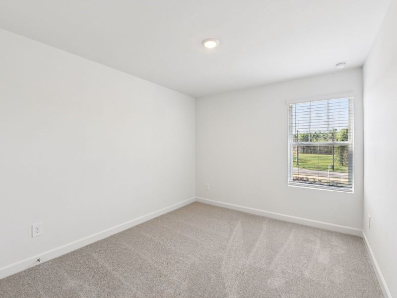 Spacious, unfurnished interior of a new home in Rocky River Towns, Charlotte (Image 11).