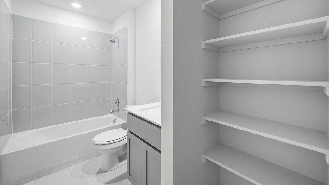 Representative furnished interior of a home built from the Brookshire by D.R. Horton in Windchime, Celina (Image 8).