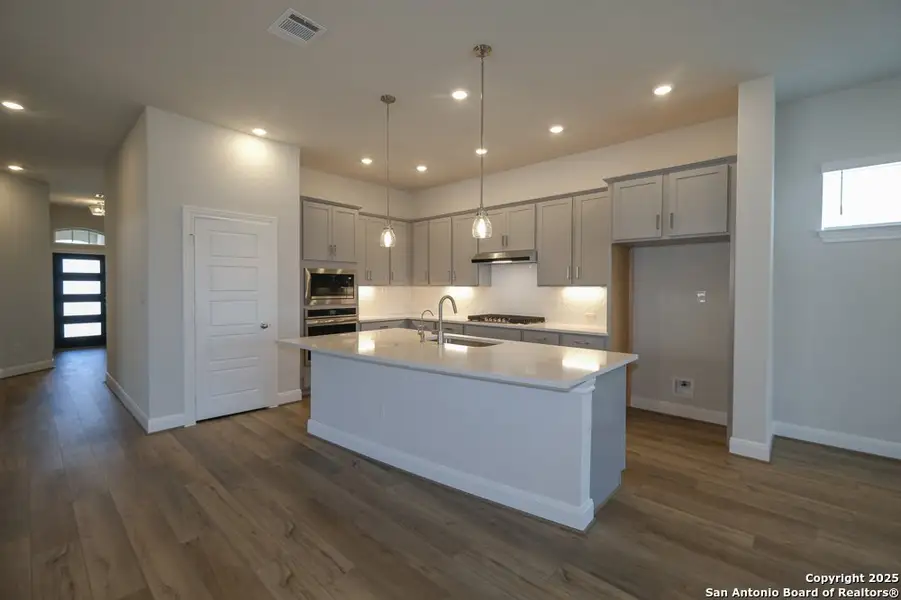 Furnished interior view inside a new home in , San Antonio (Image 6).