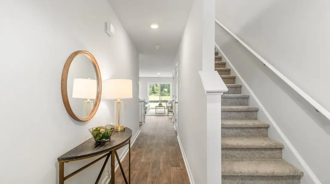 Furnished interior view inside a new home in Pine Hills Townhomes at Cane Bay, Summerville (Image 7).