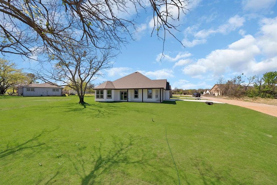 Exterior details and patio area of a home in , Runaway Bay (Image 3).