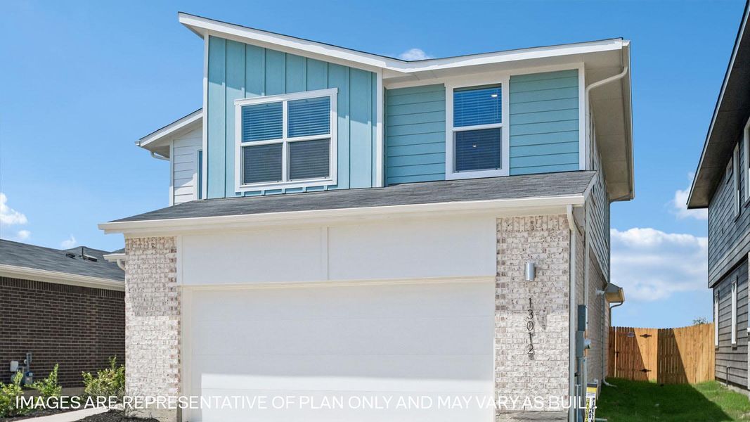 Front exterior of a new home in Frontier, Mustang Ridge, TX, highlighting curb appeal (Image 20). Front exterior of a new home in Frontier, Mustang Ridge, TX, highlighting curb appeal (Image 20).