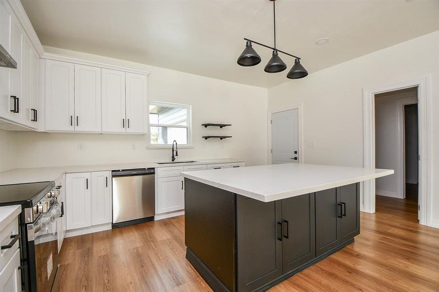 A lovely window above the sink lets in lots of natural light and gives you a beautiful view of the outdoors!