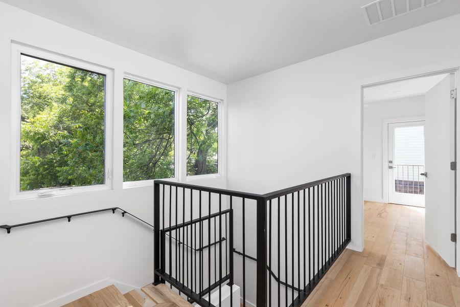 Staircase with wood finished floors