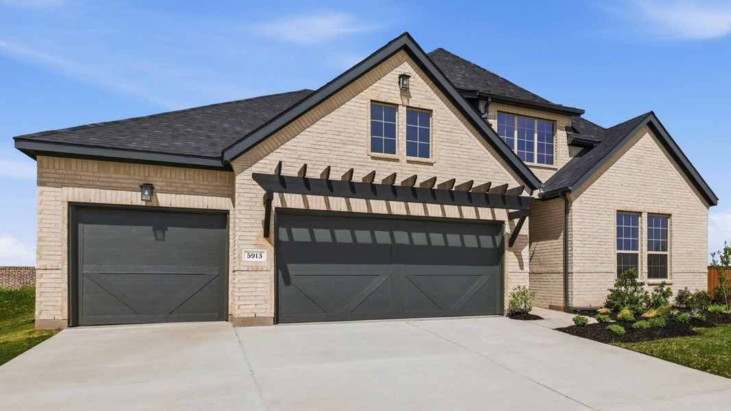 Front exterior of a new home in Green Meadows Classic, Celina, TX, highlighting curb appeal (Image 2). Front exterior of a new home in Green Meadows Classic, Celina, TX, highlighting curb appeal (Image 2).