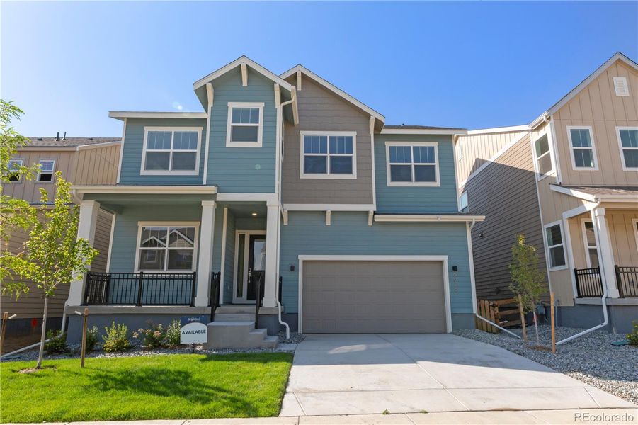 Front exterior of a new home in Dillon Pointe - Journey, Broomfield, CO, highlighting curb appeal (Image 22).