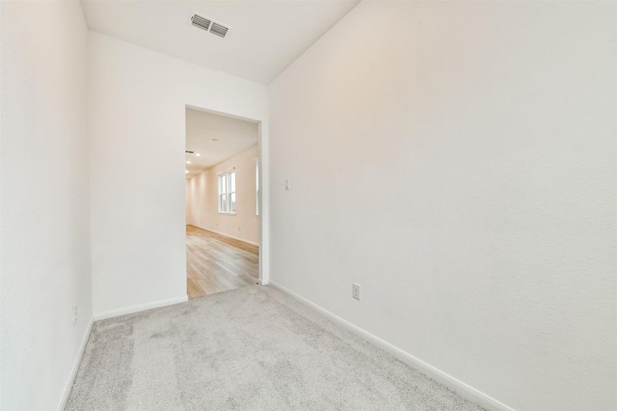 Another view of the office, storage space or play area.