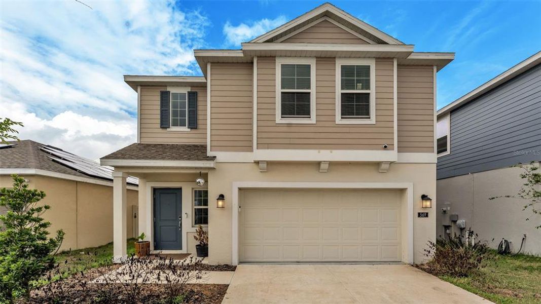 Front exterior of a new home in , Winter Haven, FL, highlighting curb appeal (Image 24).