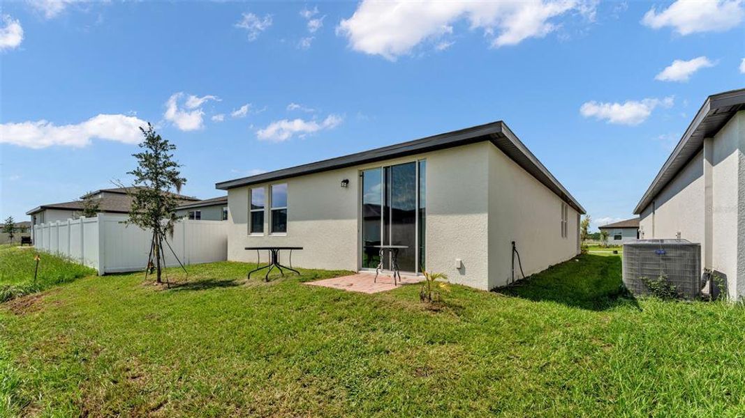 Front exterior of a new home in , Winter Haven, FL, highlighting curb appeal (Image 2). Front exterior of a new home in , Winter Haven, FL, highlighting curb appeal (Image 2).