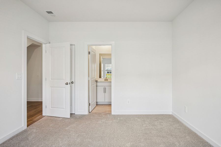 Spacious, unfurnished interior of a new home in Greystone - Highland Townhomes, Smyrna (Image 16).