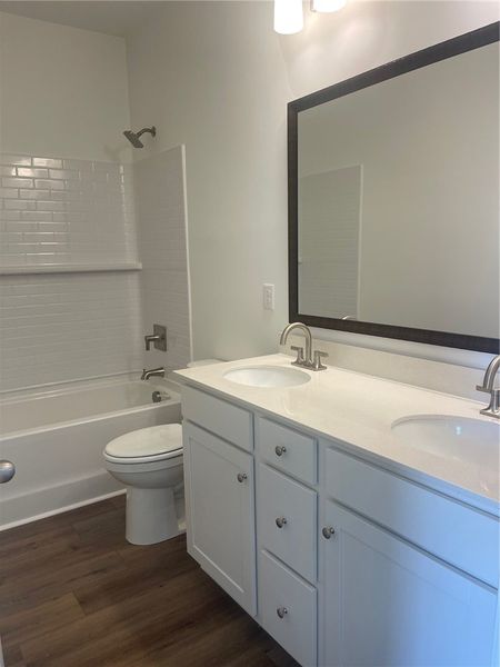 Furnished interior view inside a new home in Springwood Grove, Central (Image 8).