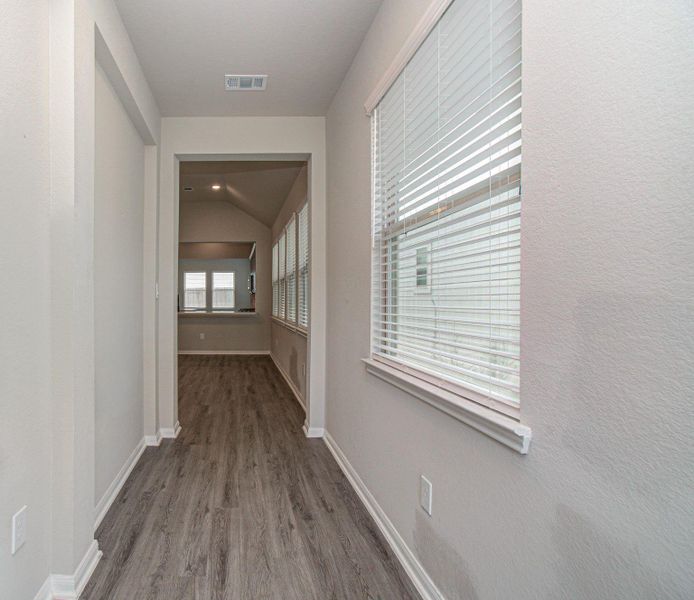 Home provides a very nice entry foyer with upgraded decorative wall and window for good natural lighting