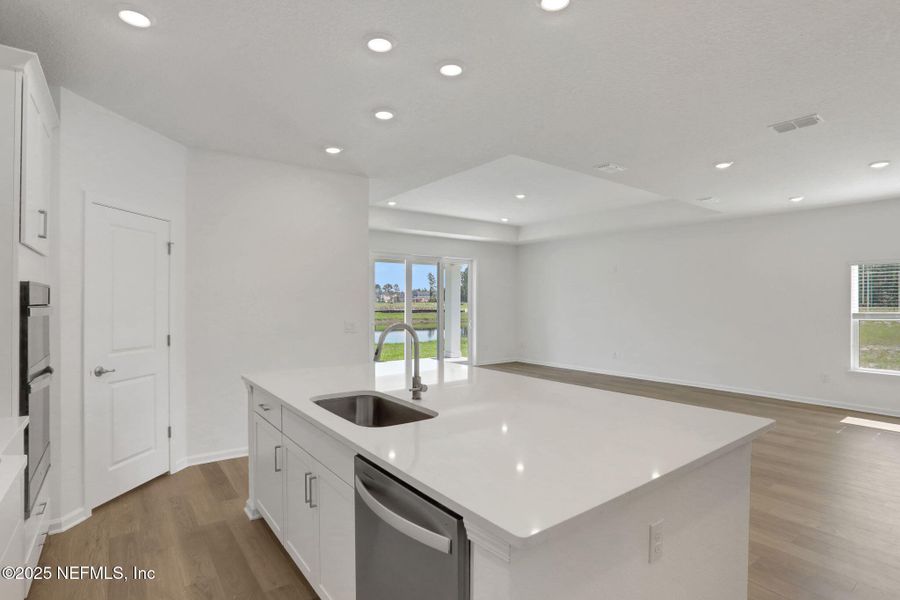 Furnished interior view inside a new home in Brook Forest - Single Family Homes, St. Augustine (Image 5). Furnished interior view inside a new home in Brook Forest - Single Family Homes, St. Augustine (Image 5).