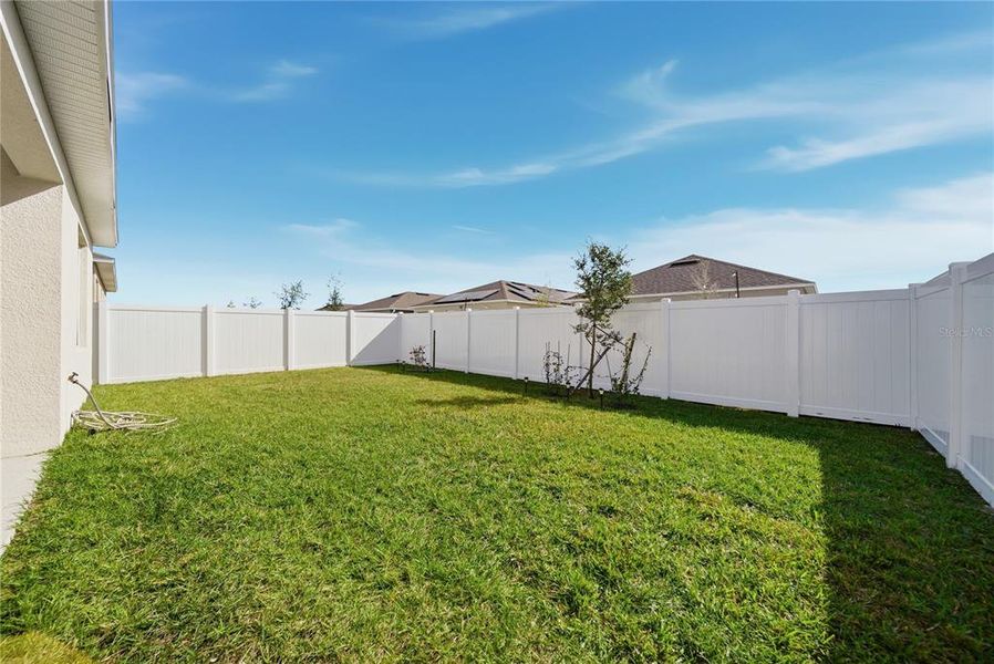 Exterior details and patio area of a home in , Harmony (Image 21). Exterior details and patio area of a home in , Harmony (Image 21).