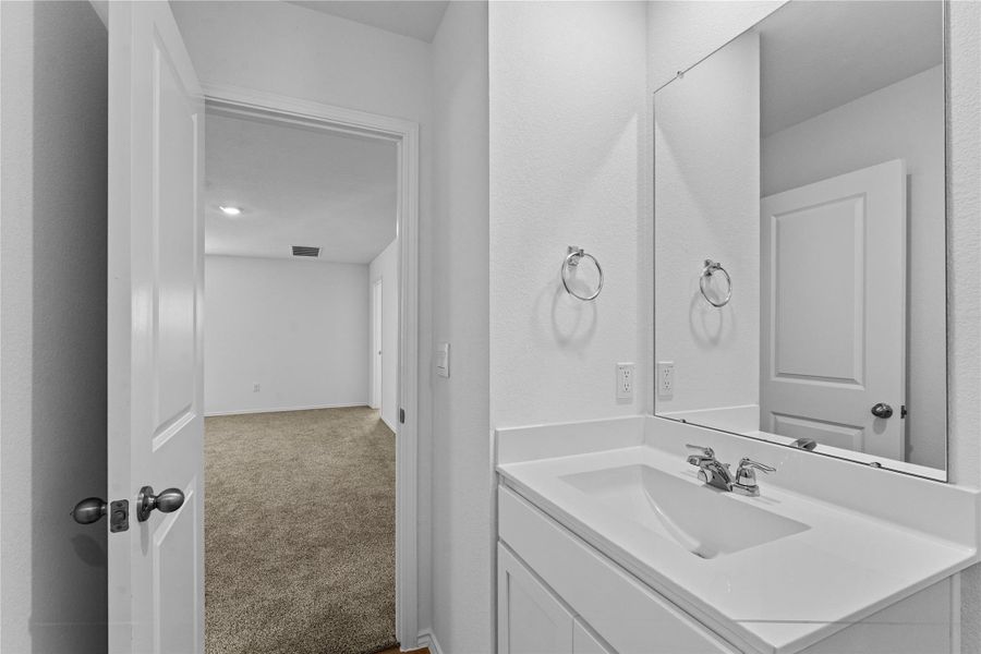 Furnished interior view inside a new home in Prairie Lakes, Buda (Image 10).
