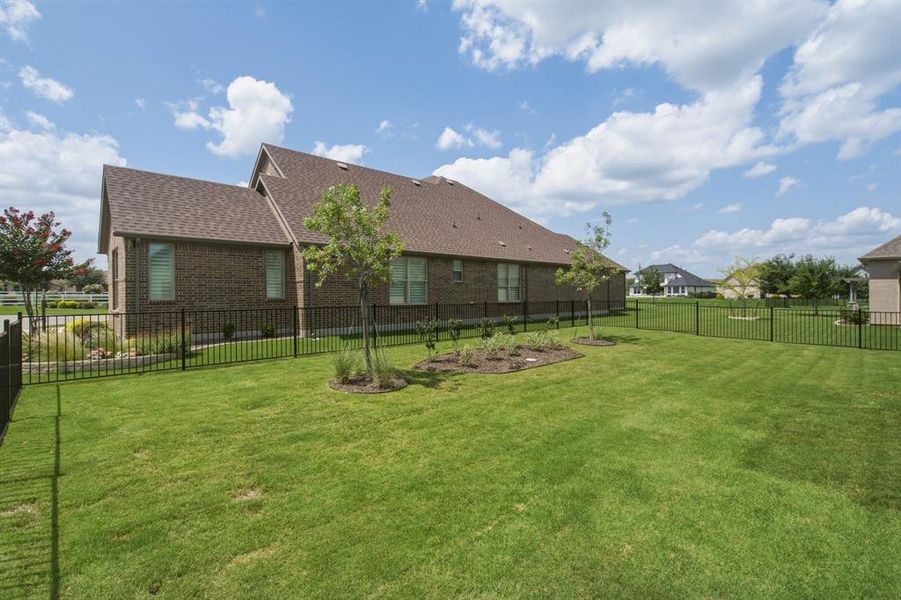 Exterior details and patio area of a home in , Denton (Image 24).