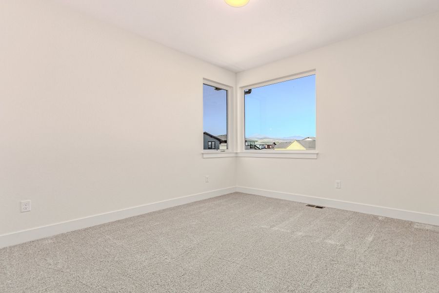 Spacious, unfurnished interior of a new home in West Grange, Longmont (Image 37).