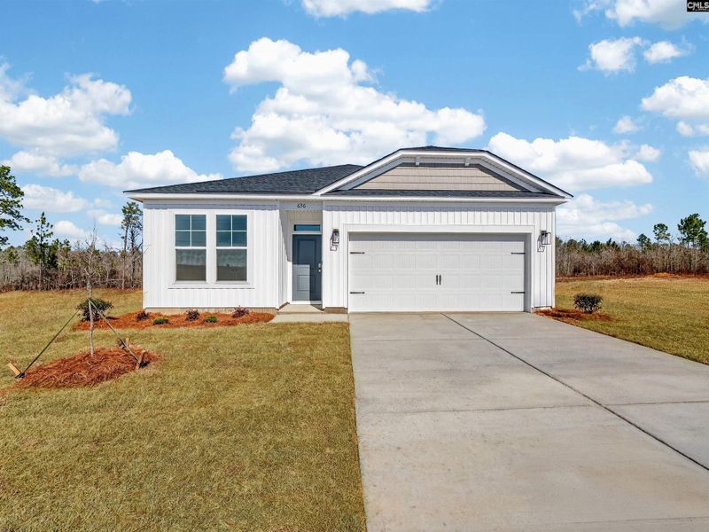Front exterior of a new home in Old Charleston Acres, Pelion, SC, highlighting curb appeal (Image 2).