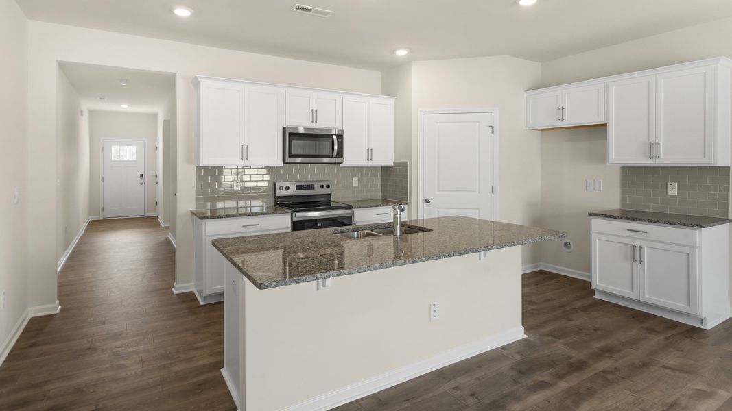 Furnished interior view inside a new home in The Grove at Matthews Landing, Fuquay Varina (Image 4).